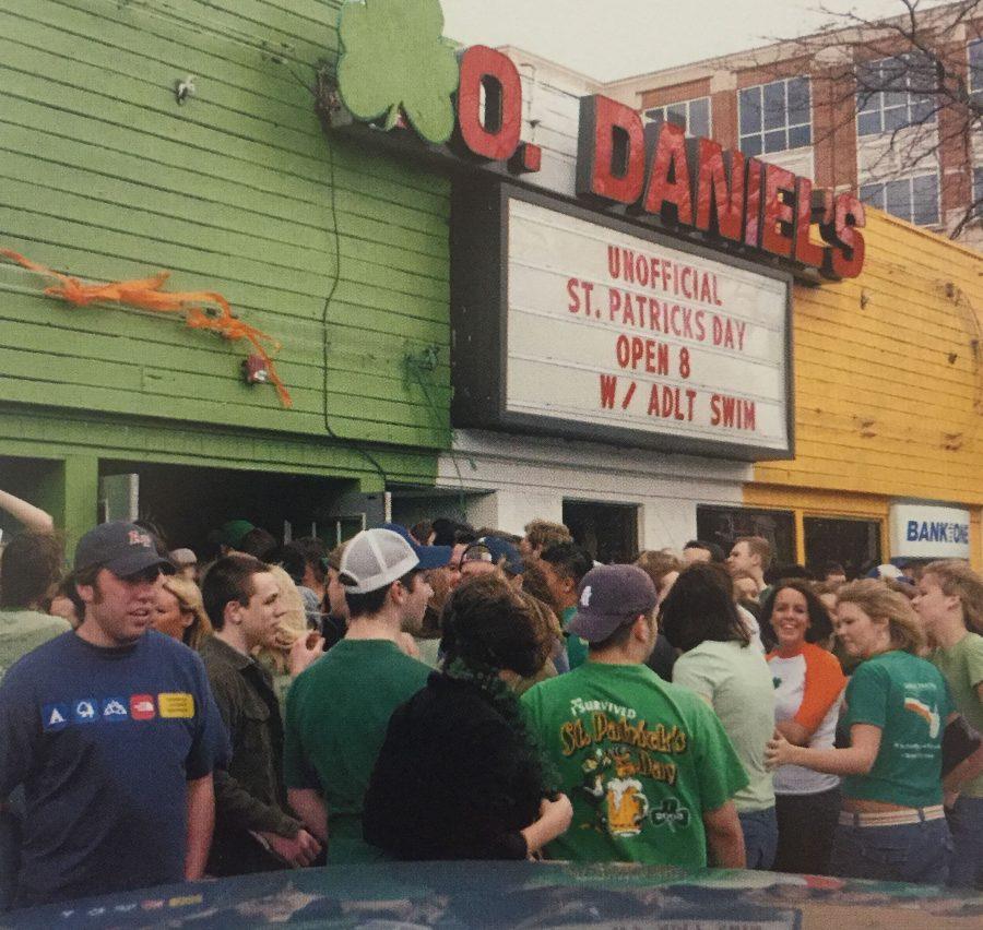Students wait outside Co. Daniels, a popular bar at the time, on Unofficial, March 5th, 2004.