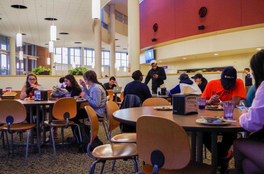 Students eat at the Ikenberry Dinning Hall and enjoy the multiple cuisines it has to offer.