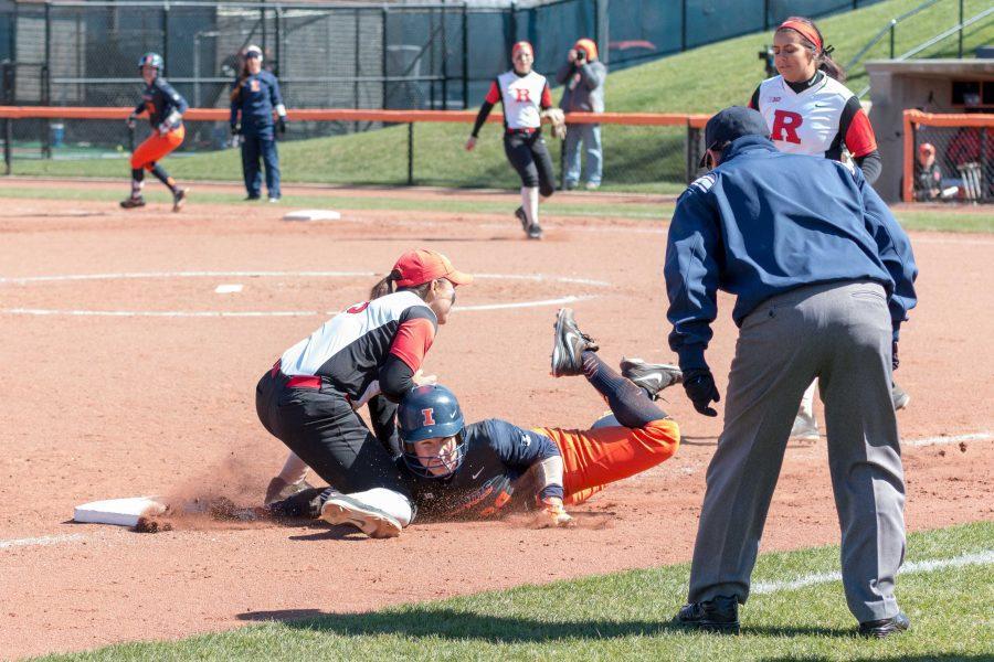 Illinois’ Annie Fleming dives back to third during a game against Nebraska at Eichelberger Field on April 2. Fleming had a strong performance the last time the Illini played at ISU. 