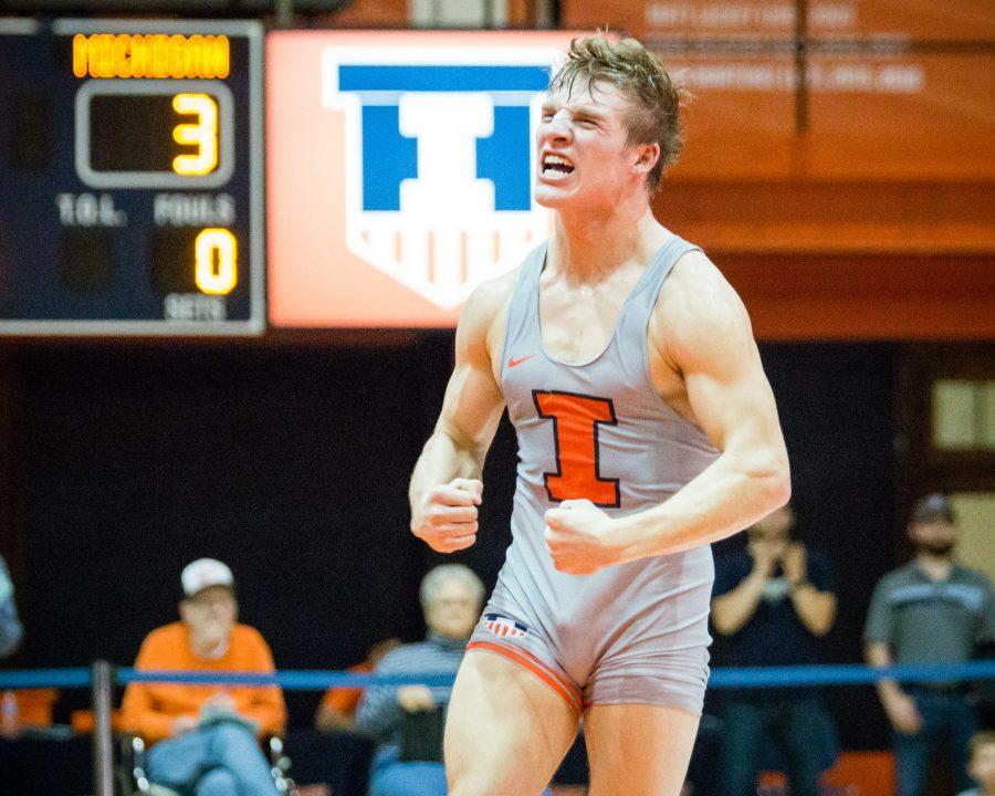 Illinois%E2%80%99+Kyle+Langenderfer+celebrates+after+defeating+Michigan%E2%80%99s+Brian+Murphy+in+the+157+pound+weight+class+during+the+match+at+Huff+Hall+on+Jan.+20.+Langenderfer+and+eight+of+his+roommates+are+preparing+for+the+Big+Ten+tournament.