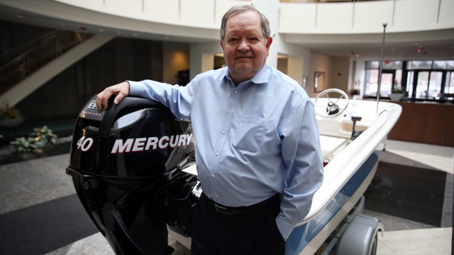 Brunswick Corporation Chairman and Chief Executive Officer Mark D. Schwabero is seen with one of the companys boats and engines at the companys headquarters on Thursday, Feb. 19, 2016 in Lake Forest, Ill. 