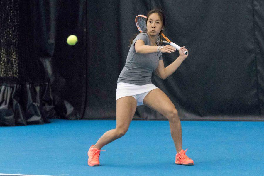 Illinois Louise Kwong gets ready to return the ball during the match against Nebraska at the Atkins Tennis Center on Sunday, April 3. 