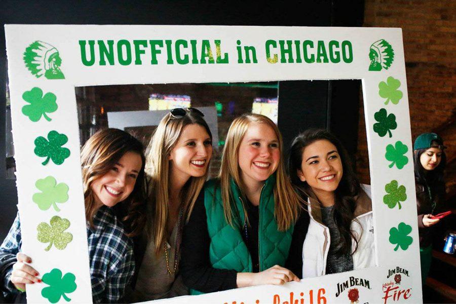 Four green-clad girls attend Unofficial in Chicago in Wrigleyville on March 4, 2016.