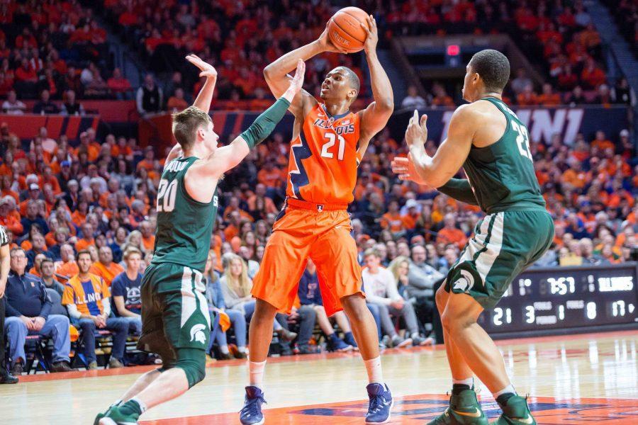 Illinois Malcolm Hill (21) pulls up for a jumper during the game against Michigan State at State Farm Center on Wednesday, March 1.