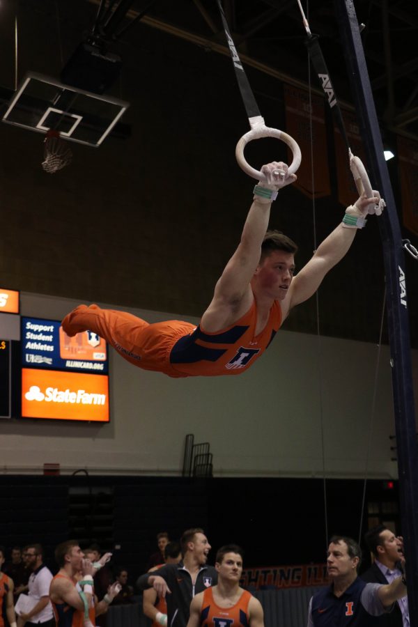 Alex Diab works the still rings against Minnesota at Huff Hall on Jan. 28. Illinois came in third at last Sunday’s national championship. 