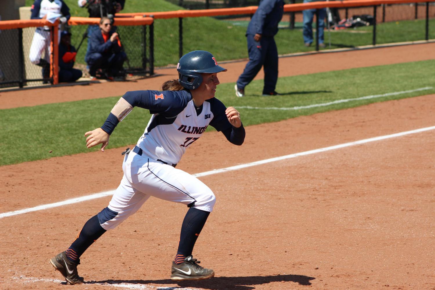 Illinois’ Stephanie Abello tries to beat out a groundball against Rutgers at Eichelberger Field on April 3, 2016. The Illini split a series against Wisconsin this past weekend. 
