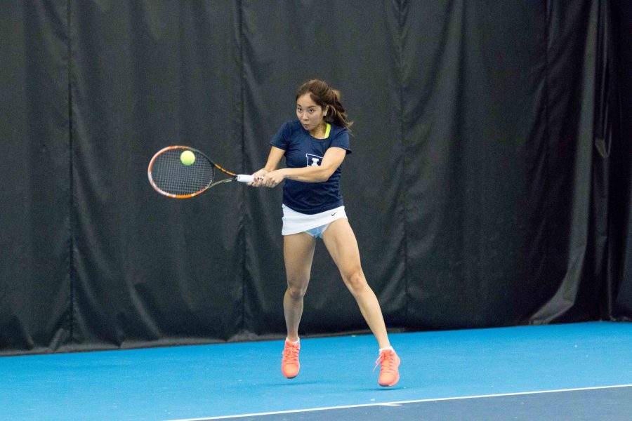 Illinois’ Louise Kwong hits a backhand against DePaul at the Atkins Tennis Center on Feb. 19. The Illini will face Michigan State and Michigan this weekend, where head coach Evan Clark looks for a win.