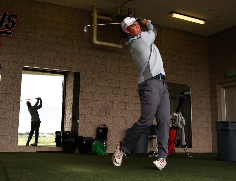 Nick Hardy practices at the Demirjjan Golf Practice Facility on April 6.