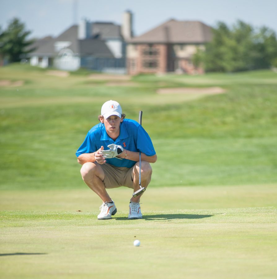 Former Illinois golfer Thomas Pieters lines up his putt to the first hole at the Stone Creek Golf Club in Urbana on Wednesday, April 18, 2012.