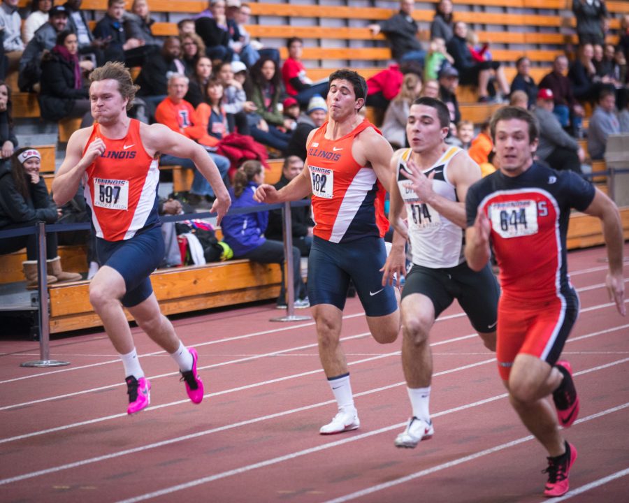 Illinois Aaron Wilks (597) and Ben Dodds (582) sprint to the finish during the Mens 60 Meter Dash at the Orange & Blue meet at the Armory on Saturday, Feb. 21, 2015.