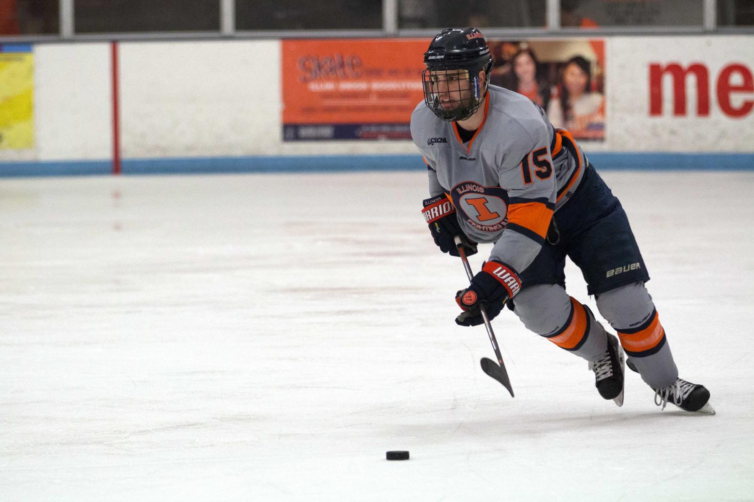 Eric Cruickshank gains possession of the puck and takes it up the ice to Robert Morris’ zone on Feb. 18. Illinois fell to Robert Morris 3-2. The team holds optimism for next season.