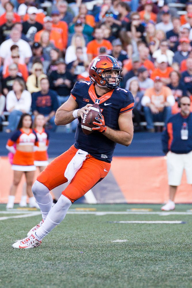 Illinois backup quarterback Chayce Crouch (7) looks to pass the ball during the game against Purdue at Memorial Stadium on Saturday, October 8. The Illini lost 34-31.