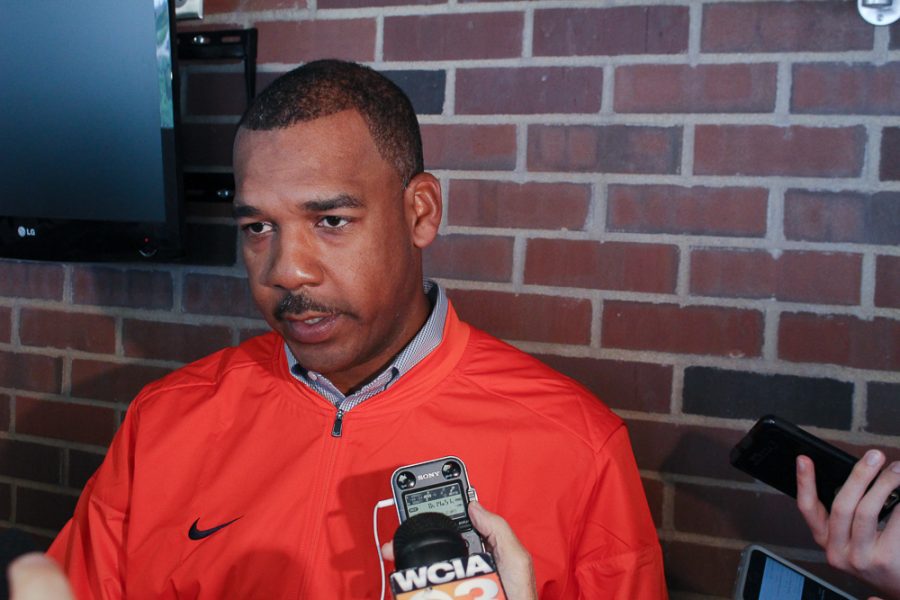 Illinois assistant coach Garrick McGee answers questions at a press conference at Memorial Stadium on Monday.