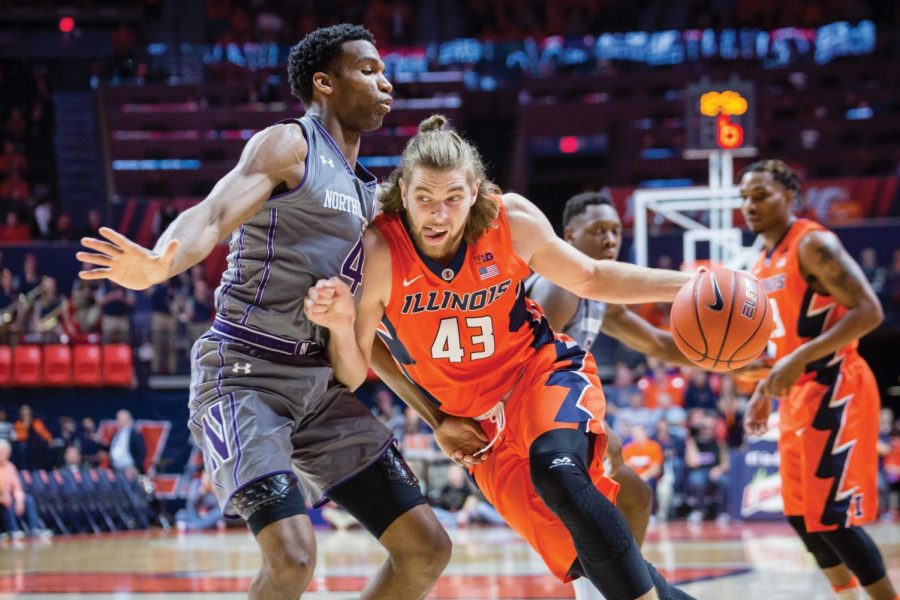 Illinois+Michael+Finke+%2843%29+drives+to+the+basket+during+the+game+against+Northwestern+at+State+Farm+Center+on+Tuesday%2C+February+21.
