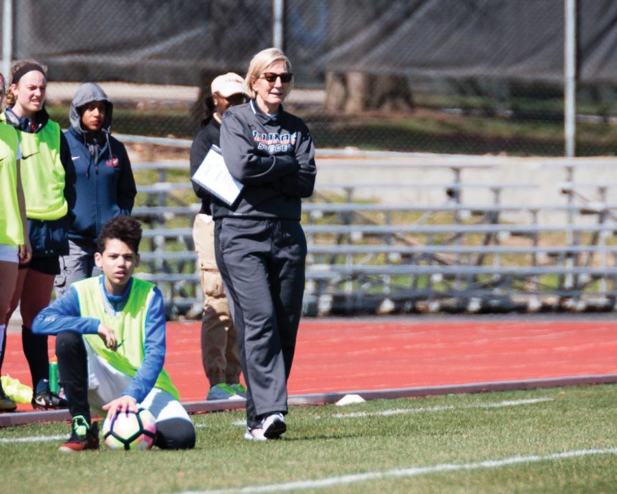 Illinois head coach Janet Rayfield shouts instructions to her team during the game against Loyola at the Illinois Soccer Stadium on Saturday, April 1. The Illini won 2-1.