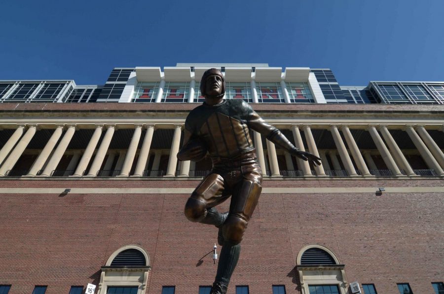 The Harold “Red” Grange statue is located near the west entrance of Memorial Stadium. Grange’s Homecoming Weekend game in 1924 is considered one of the best performances in the stadium to date.