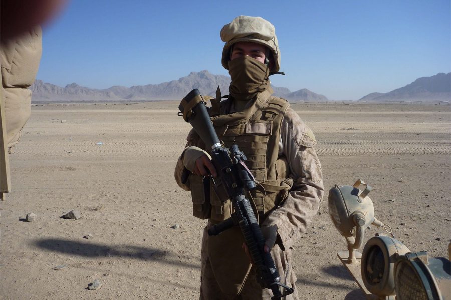 Branden Dyke poses for a photo in the Helmand Province, Afghanistan in 2010. Photo courtesy of Ashley Anderson.