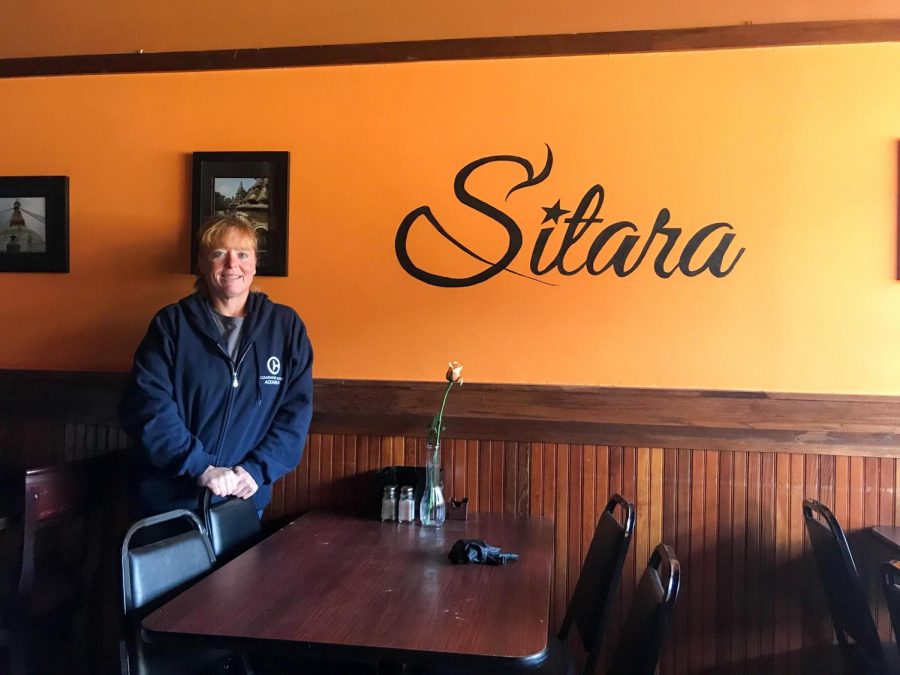  Holli Gomes, co-owner of Sitara, sits in her restaurant at 114 S Race St. in Urbana. Sitara was forced to close in October after a kitchen fire, but should reopen within the next two months. 