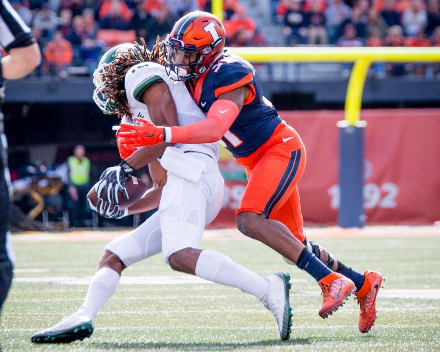 Illinois linebacker Tré Watson makes a tackle during the game against Michigan State at Memorial Stadium on Nov. 5, 2016. Watson is one of the five players who are transferring next season.