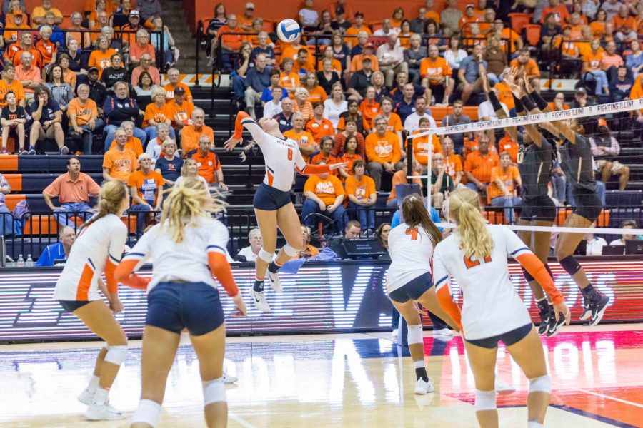 Illinois outside hitter Beth Prince (8) hits the ball during the match against Purdue at Huff Hall on Friday, October 6. The Illini lost 3-0.