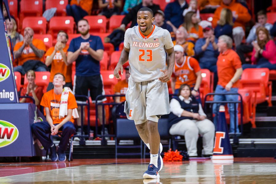 Illinois guard Aaron Jordan celebrates after hitting a three during the game against North Carolina Central at State Farm Center on Friday, Nov. 24, 2017.  Jordan was disappointed in the teams performance in the first half despite the Illinis completion of the nonconference homestand undefeated.