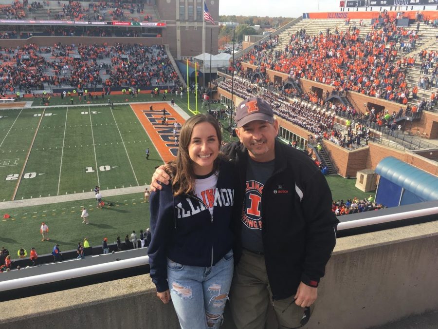 Molly Zupan and her father celebrate Dads Weekend 2016 by watching the football game. Mollys father made a quick enough recovery to visit her during this important weekend. 