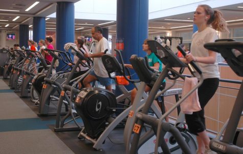 Students use the elliptical machines at CRCE. CRCE is just one of many workout options on campus.