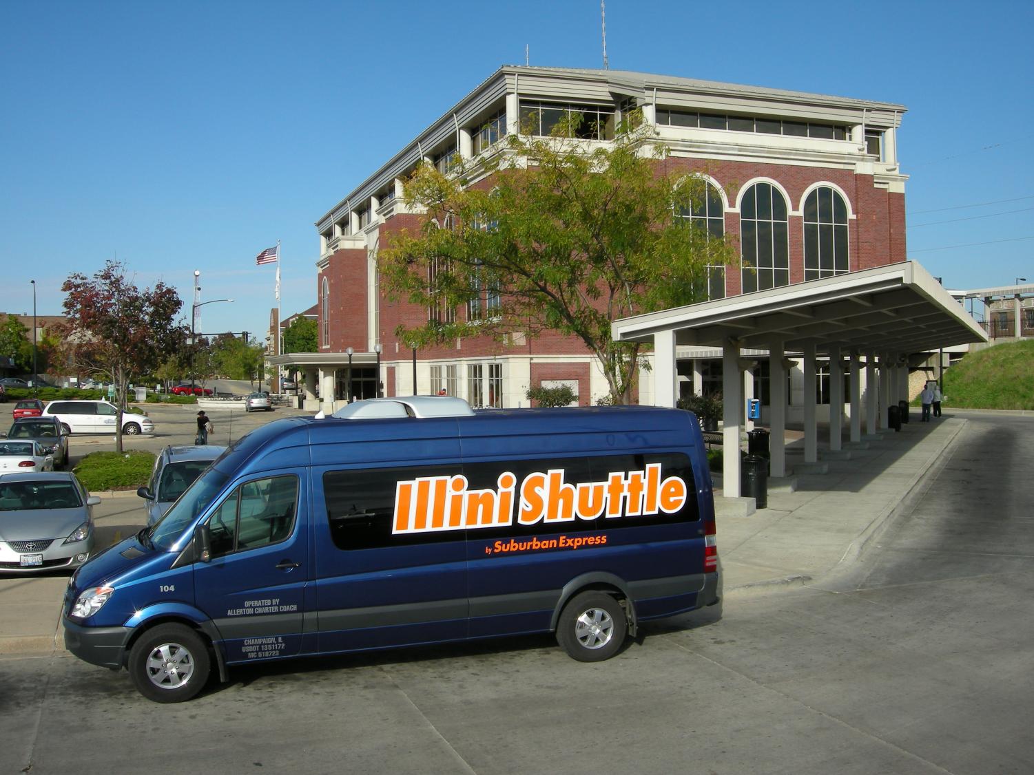   One of the smaller vehicles operated by Suburban Express, as part of its Illini Shuttle operation, is located at the Illinois Terminal in Champaign. 