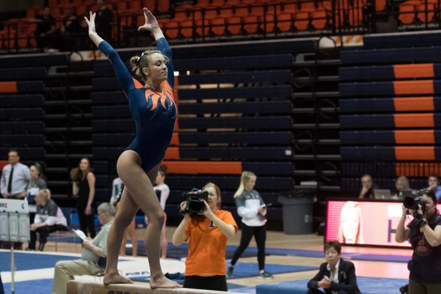 Bridget Hodan competes on beam against Michigan State in Huff Hall on February 17.