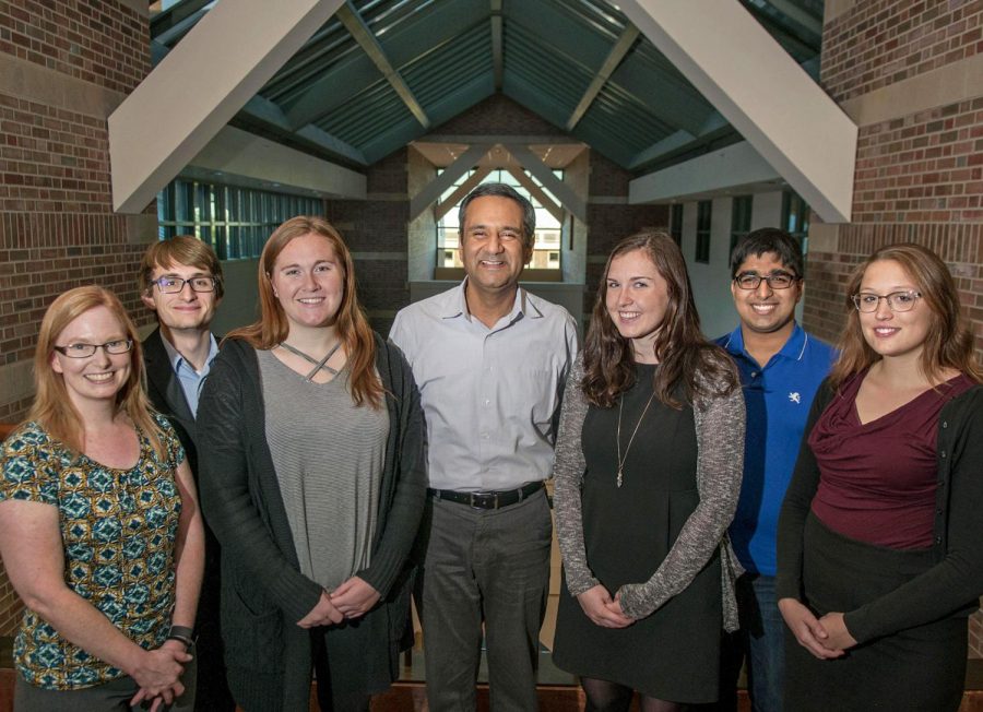 Cancer Scholars Director Rohit Bhargava (center) joins Program Advisor Marcia Pool (far left) and a few of the first cohort of undergraduate students (left to right): Pierce Hadley, Lauren Sargeant, Madelyn O’Gorman, Sreyesh Satpathy, and Miranda Dawson outside Bhargava’s office at the Beckman Institute.
