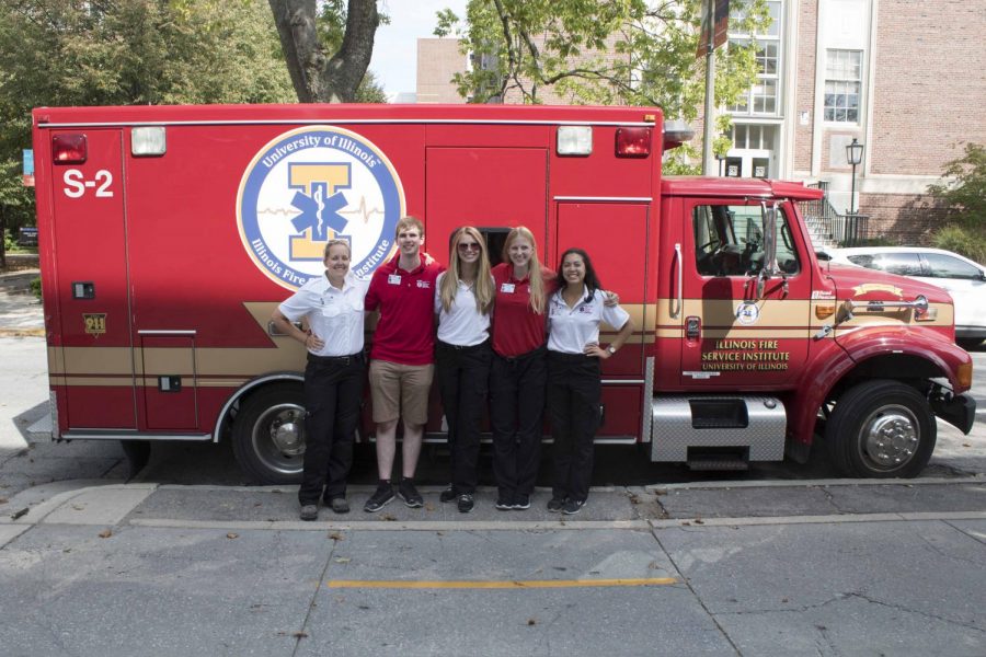 Students stand with an ambulance after completing the Universitys EMT course. Only 24 students are admitted into the course in an effort to offer a hands-on skills and national homework required for courses across the country. For students to pass the class, they must receive an 80 percent or higher. 
