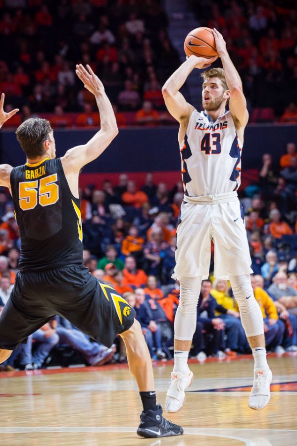Illinois forward Michael Finke shoots the ball during the game against Iowa at the State Farm Center on Thursday.