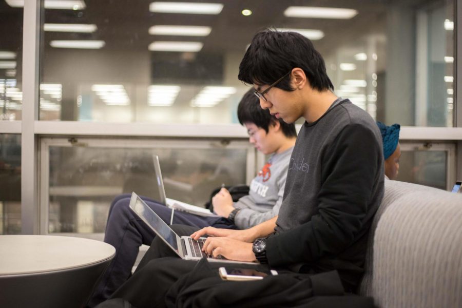 Zhining Qiu, freshman in General Studies, and Chengcheng Gan, freshman in Engineering Physics, studying for finals in the Undergraduate Library on Tuesday, Dec. 12, 2017.