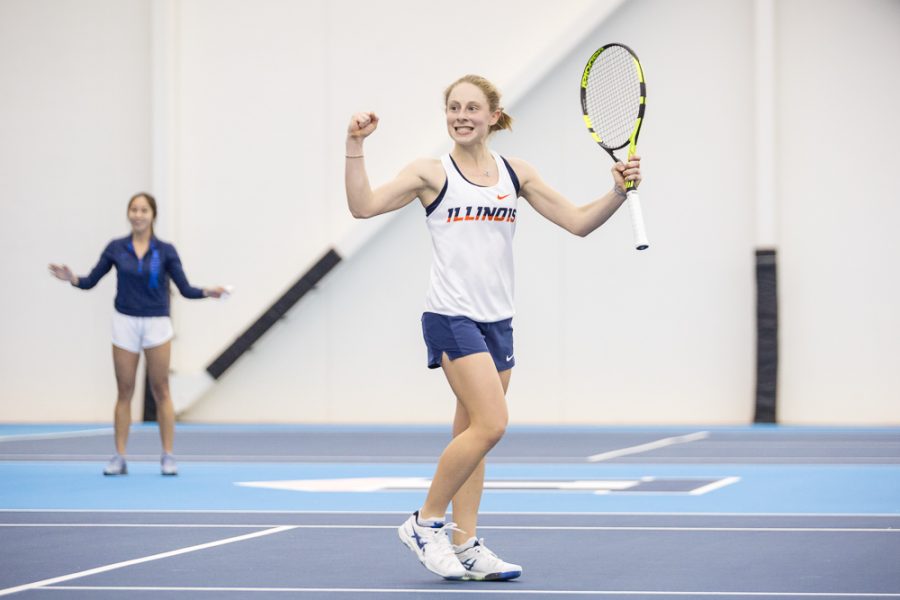 Illinois' Mia Rabinowitz celebrates after winning her singles match against Texas at Atkins Tennis Center on Friday, Feb. 2, 2018. Rabinowitz won her singles match 6-2, 7-6[2], and the Illini won 4-2.