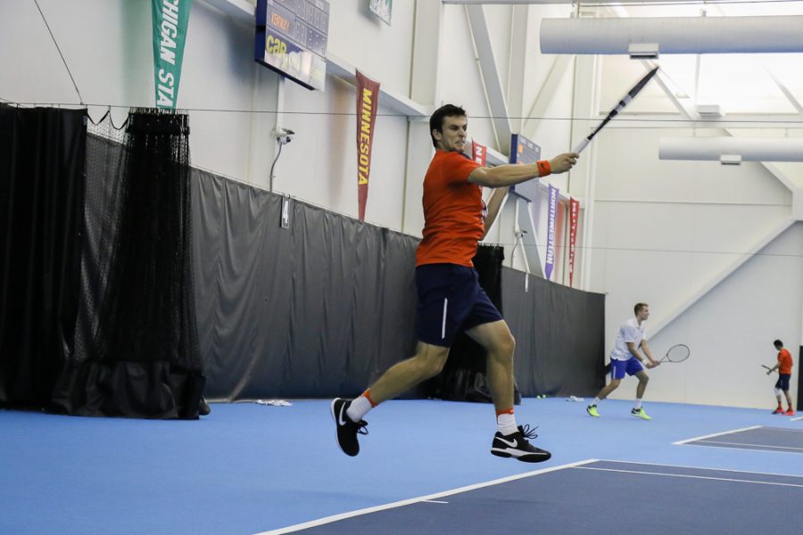 Illinois  Aleks Vukic follows through on a swing in the meet against University of Kentucky on Friday, Feb. 24 at the Atkins Tennis Center in Urbana.