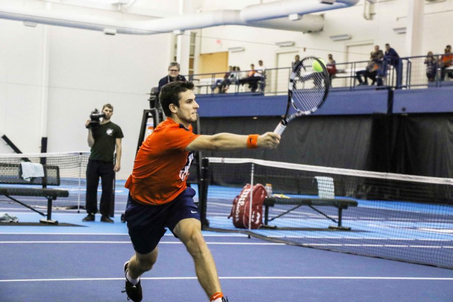 Illinois++Aleks+Vukic+strikes+back+the+ball+in+the+meet+against+University+of+Kentucky+on+Friday%2C+Feb.+24+at+the+Atkins+Tennis+Center+in+Urbana.