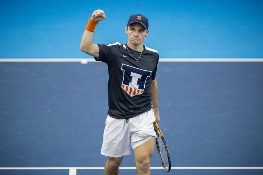 Illinois' Zeke Clark celebrates during the match against California at the Atkins Tennis Center on Friday, Feb. 9, 2018. The Illini won 4-0.