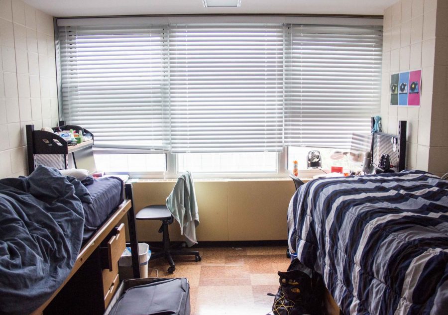 Student dorm room in Pensylvania Avenue Residence Hall. It is important to clean up the room often so that there will be more livable room.