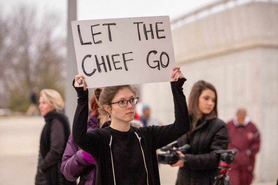 Protesters of Chief Illiniwek gather outside the west entrance of the State Farm Center before the basketball game against Purdue on Thursday.