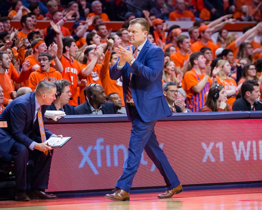 Illinois head coach Brad Underwood claps as he walks back to the bench during the game against Purdue at the State Farm Center on Feb. 22. Underwood has recruited Oak Hill Academy center Kofi Cockburn for the class of 2019.
