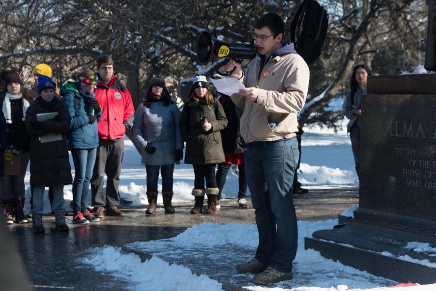 Graduate employees protest at the Alma Mater for a fair contract on Jan 18. The Graduate Employees Organization announced this morning that it will begin striking Feb. 26 if an agreement with University administration is not reached beforehand.