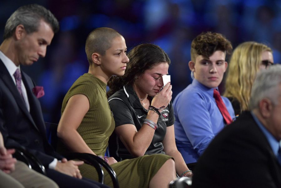 Marjory Stoneman Douglas High School student Emma Gonzalez comforts a classmate during a CNN town hall meeting on Wednesday, Feb. 21. Columnist Hayley believes that social media plays a big role in sparking a change in todays world.