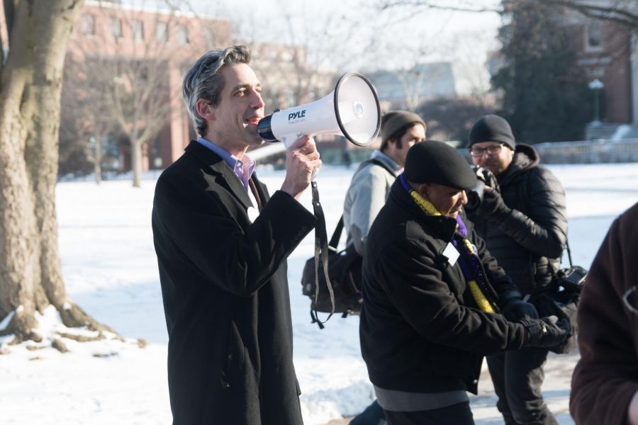 Illinois Democratic gubernatorial candidate Daniel Biss uses a megaphone to deliver a speech on the Main Quad on Thursday.