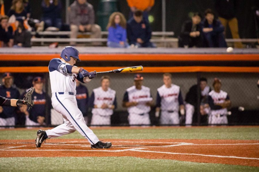 Illinois+catcher+Jeff+Korte+%2832%29+hits+an+RBI+single+to+right+giving+the+Illini+the+lead+in+the+game+against+Rutgers+at+Illinois+Field+on+Friday%2C+April+13%2C+2018.%0A