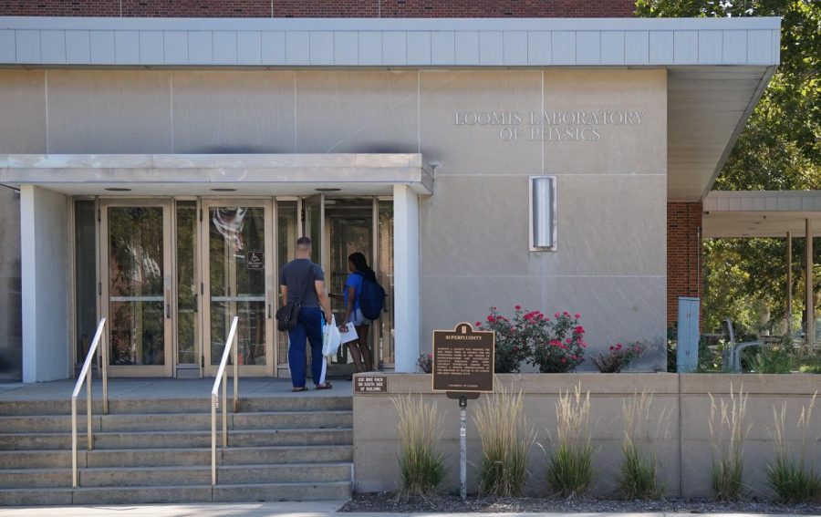 People enter Loomis Laboratory of Physics at 1110 W. Green St, where the Department of Physics is located, on Wednesday. Students will have chances to participate in the research and innovation activities through the Institute for Research and Innovation in Software for High-Energy Physics. Data from the research will also boost physics discoveries when the High-Luminosity Large Hadron
Collider starts operating in 2026.