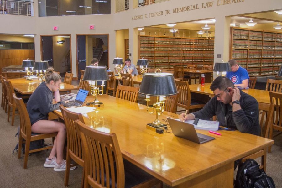Law students study in the Albert E. Jenner Jr. Memorial Law Library on Tuesday. The law school entrance test will soon be conducted digitally on tablets.