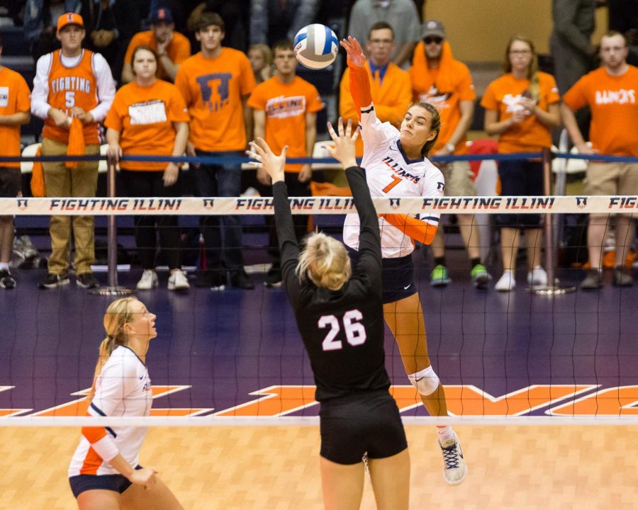 Illinois+outside+hitter+Jacqueline+Quade+hits+the+ball+from+the+back+row+during+the+match+against+Nebraska+at+Huff+Hall+on+Sept.+29.+The+Illini+lost+3-1.