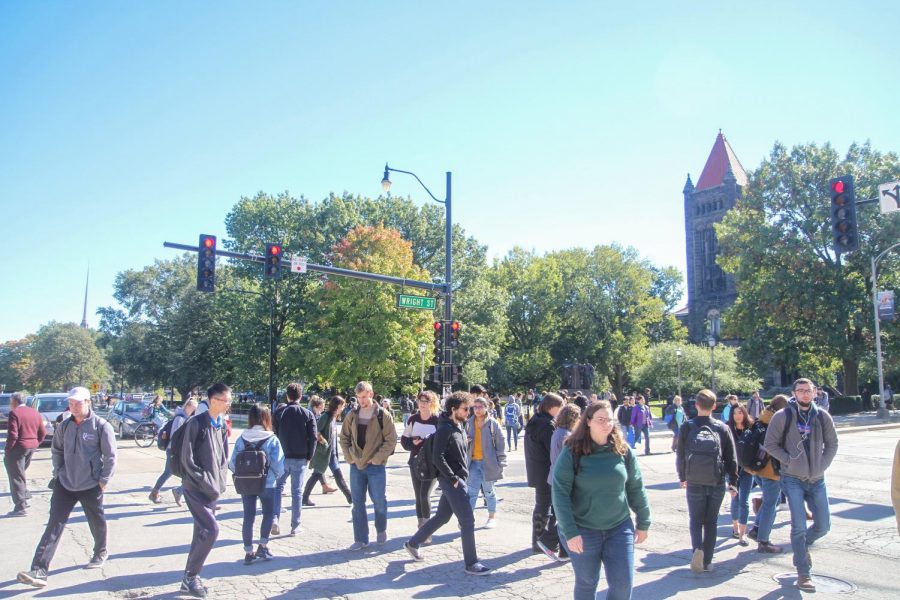 Students crossing Green and Wright to get to their morning classes on October 18, 2018.