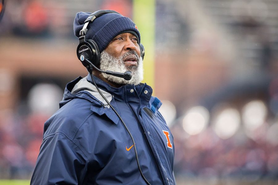 Illinois head coach Lovie Smith looks up at the scoreboard during the game against Iowa at Memorial Stadium on Nov. 17.