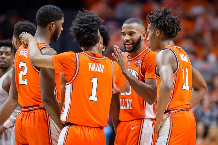 Illinois guard Aaron Jordan (23) talks to his teammates during the game against Penn State at the State Farm Center on Saturday.